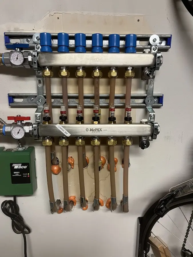 Plumber performing Gas Line Installation at a residential property in Washington